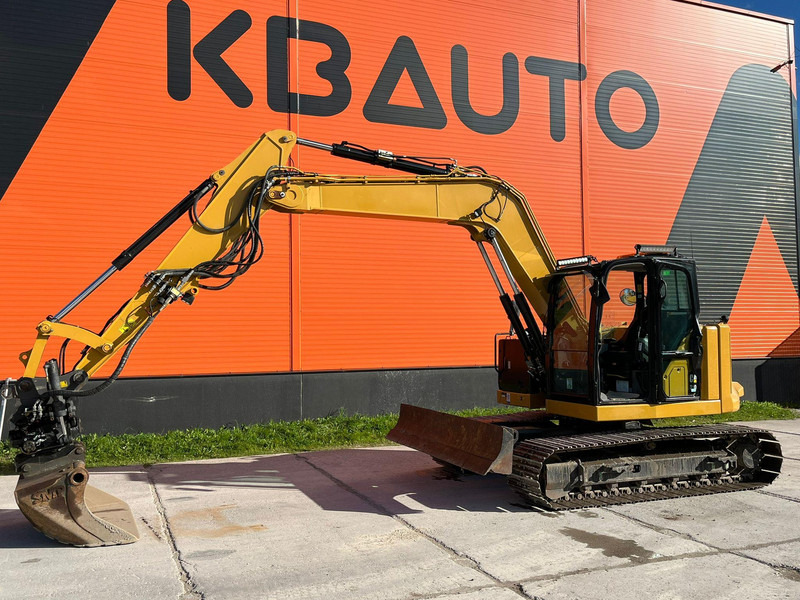 Caterpillar 310-07 + 2 BUCKETS / ROTOTILT / AC / CENTRAL LUBRICATION - Pelle sur chenille: photos 1 Caterpillar 310-07 + 2 BUCKETS / ROTOTILT / AC / CENTRAL LUBRICATION - Pelle sur chenille: photos 1