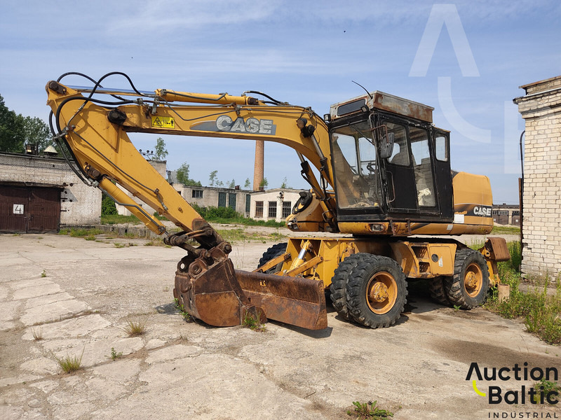 Case WX 150 - Pelle sur pneus: photos 1 Case WX 150 - Pelle sur pneus: photos 1