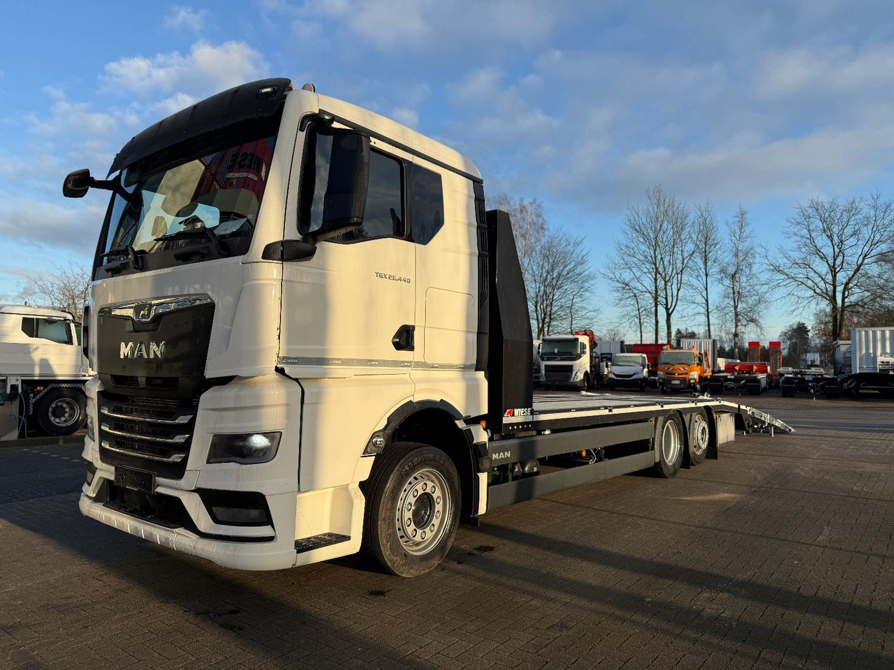 MAN Baumaschinen-  Arbeitsbühnentransporter Rampen - Camion plateau: photos 5 MAN Baumaschinen-  Arbeitsbühnentransporter Rampen - Camion plateau: photos 5