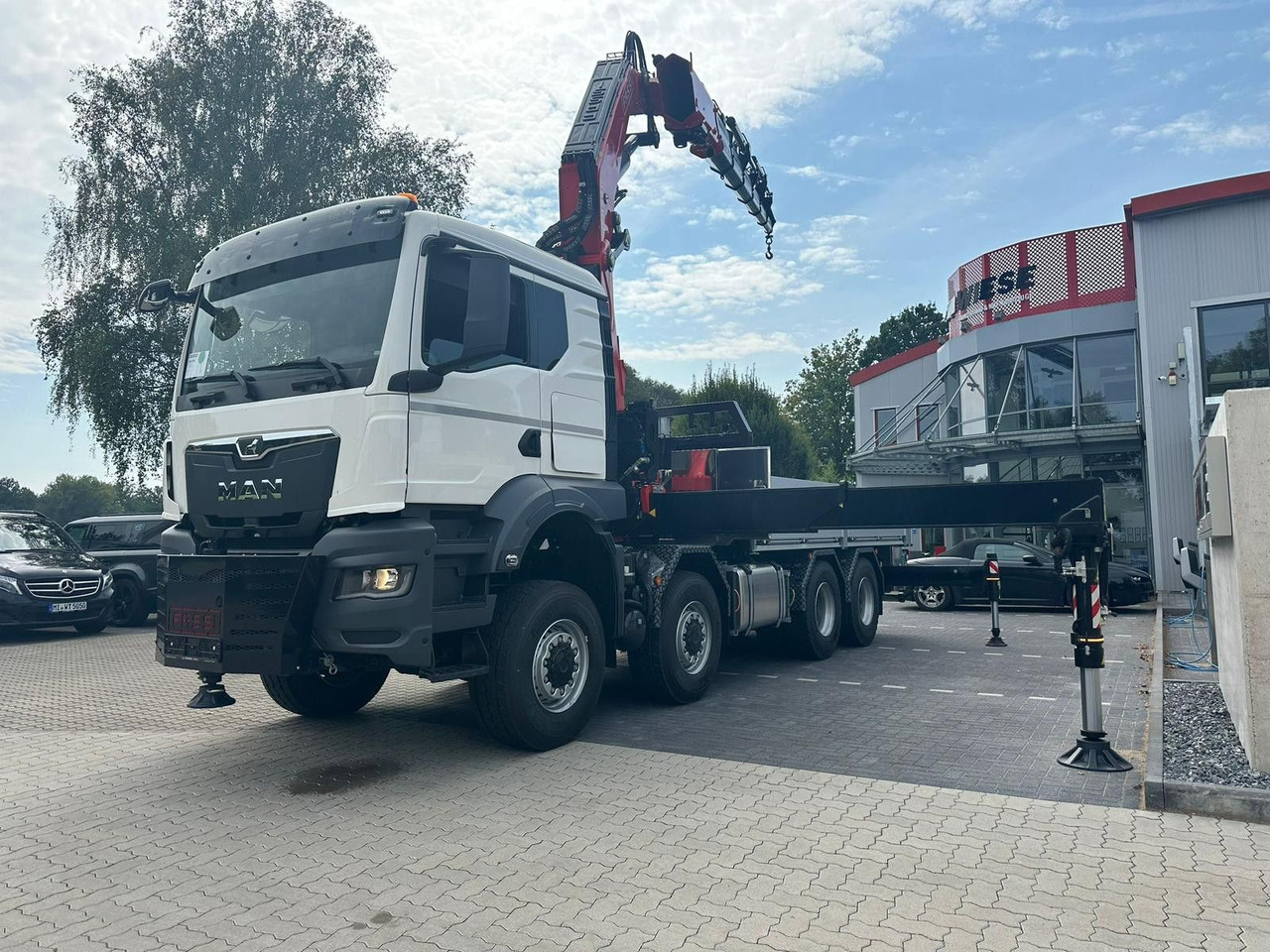 MAN TGS 41.520 8x8 mit Fassi Ladekran F710RA.2.26 - Camion plateau: photos 2 MAN TGS 41.520 8x8 mit Fassi Ladekran F710RA.2.26 - Camion plateau: photos 2