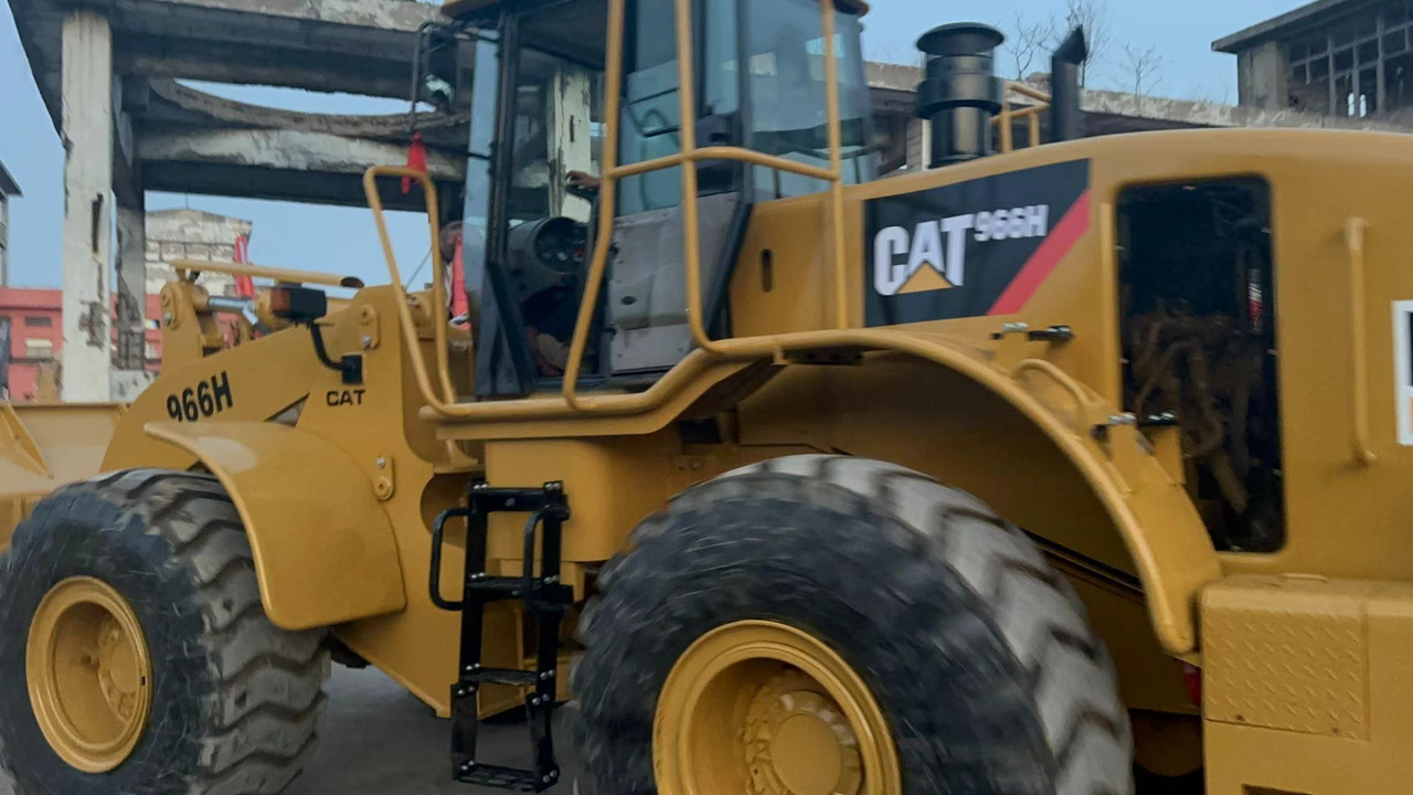 CATERPILLAR 966H - Pelle sur pneus: photos 5 CATERPILLAR 966H - Pelle sur pneus: photos 5