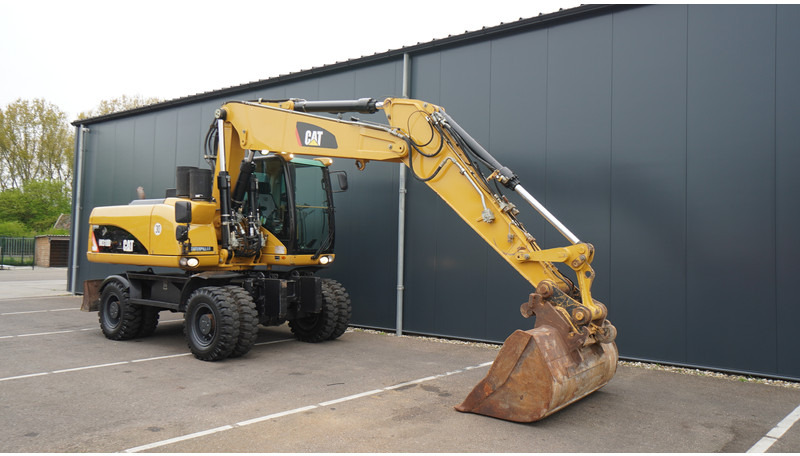 Caterpillar M318D 4X4 WHEELED EXCAVATOR - Engins de chantier: photos 4 Caterpillar M318D 4X4 WHEELED EXCAVATOR - Engins de chantier: photos 4