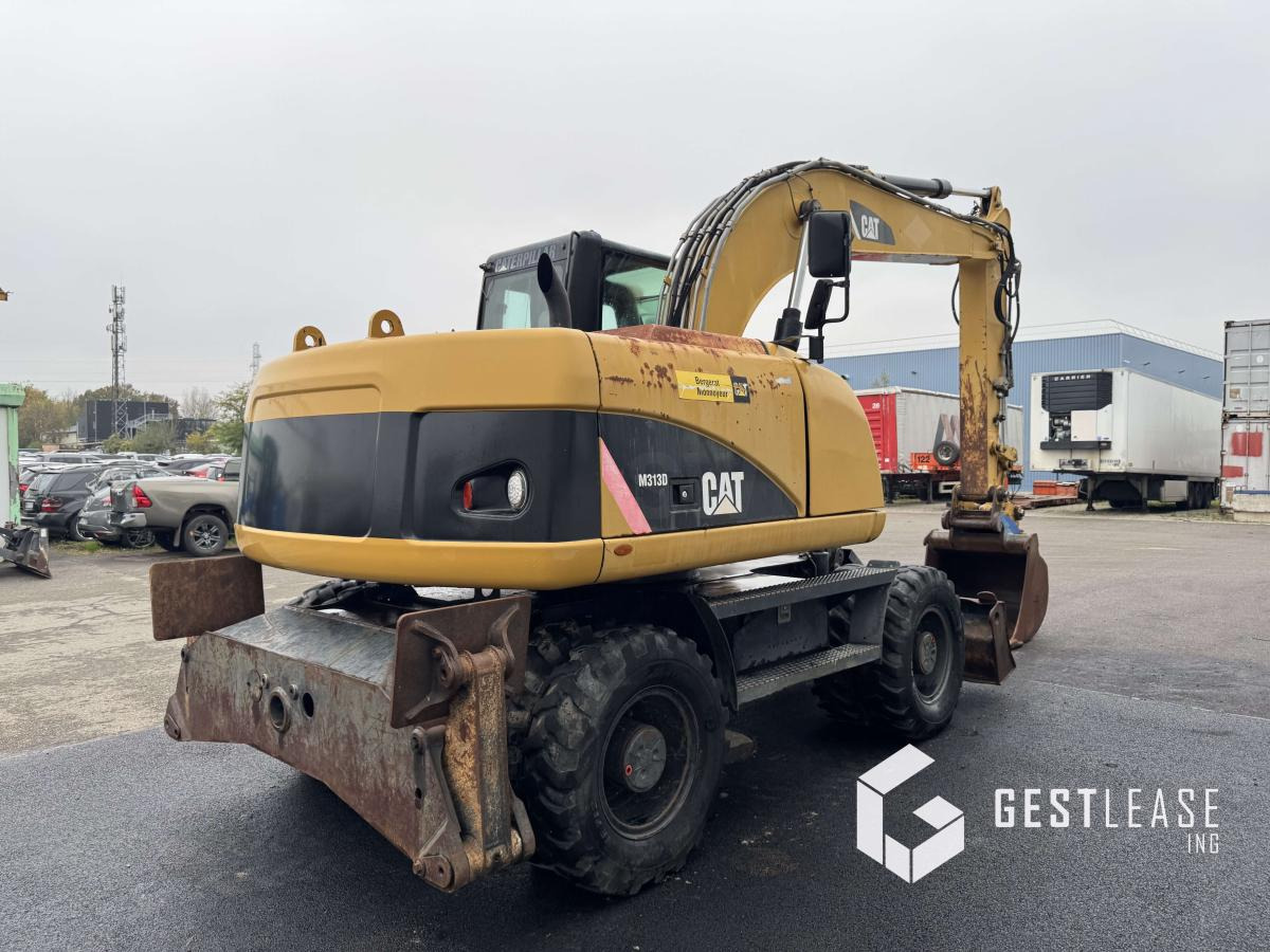 Caterpillar M313D Mono - Pelle sur pneus: photos 3 Caterpillar M313D Mono - Pelle sur pneus: photos 3