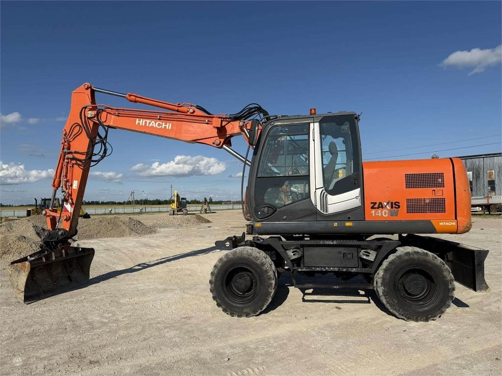 Hitachi ZX 140 W - Pelle sur pneus: photos 3 Hitachi ZX 140 W - Pelle sur pneus: photos 3