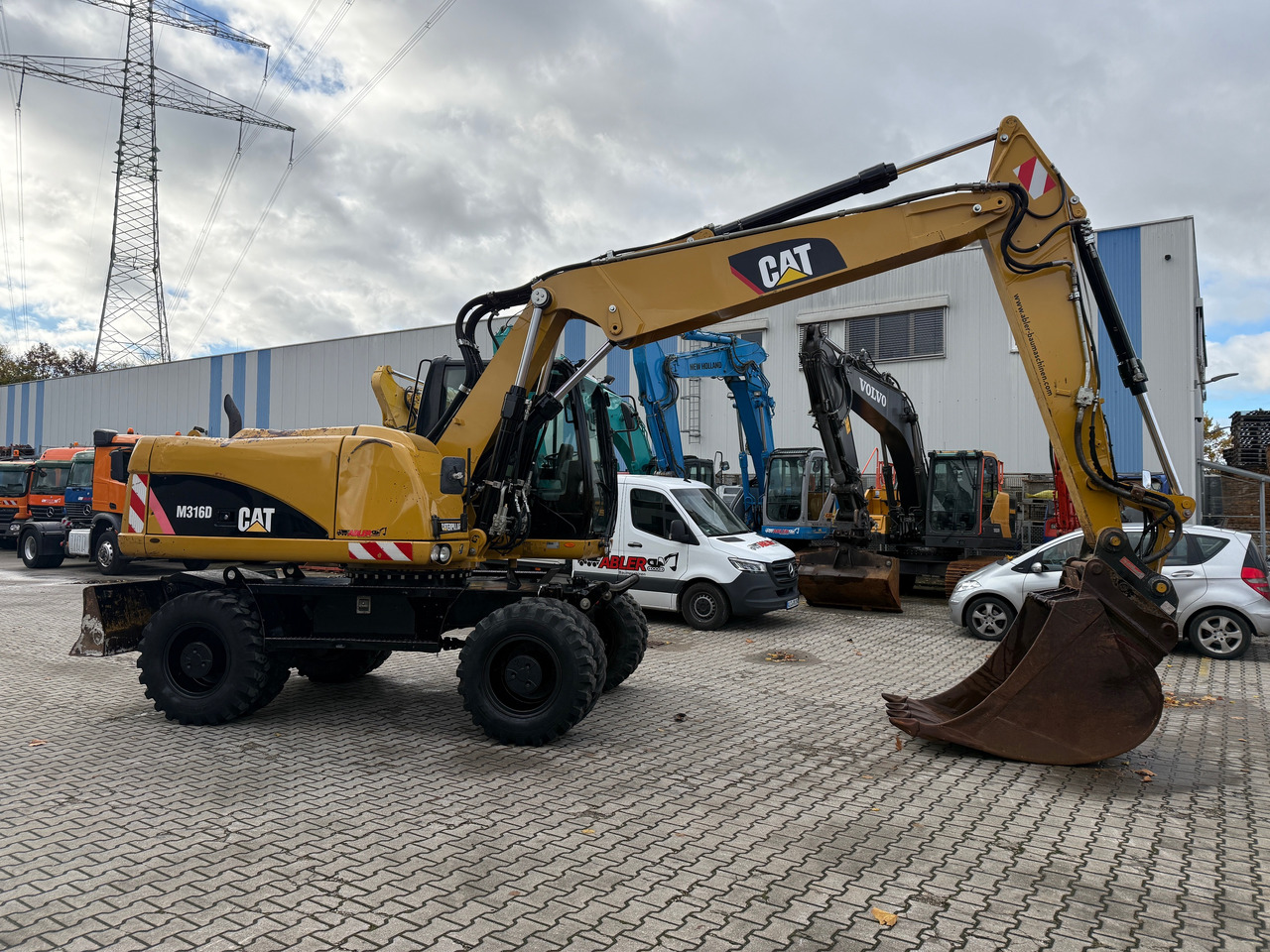 CATERPILLAR M316D Mobilbagger OQ 70/55 Klima - Pelle: photos 3 CATERPILLAR M316D Mobilbagger OQ 70/55 Klima - Pelle: photos 3