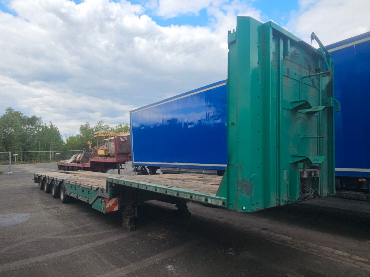 Meusburger MPG-4 Tieflader mit Radmulden 39.5t - Semi-remorque surbaissé: photos 2 Meusburger MPG-4 Tieflader mit Radmulden 39.5t - Semi-remorque surbaissé: photos 2