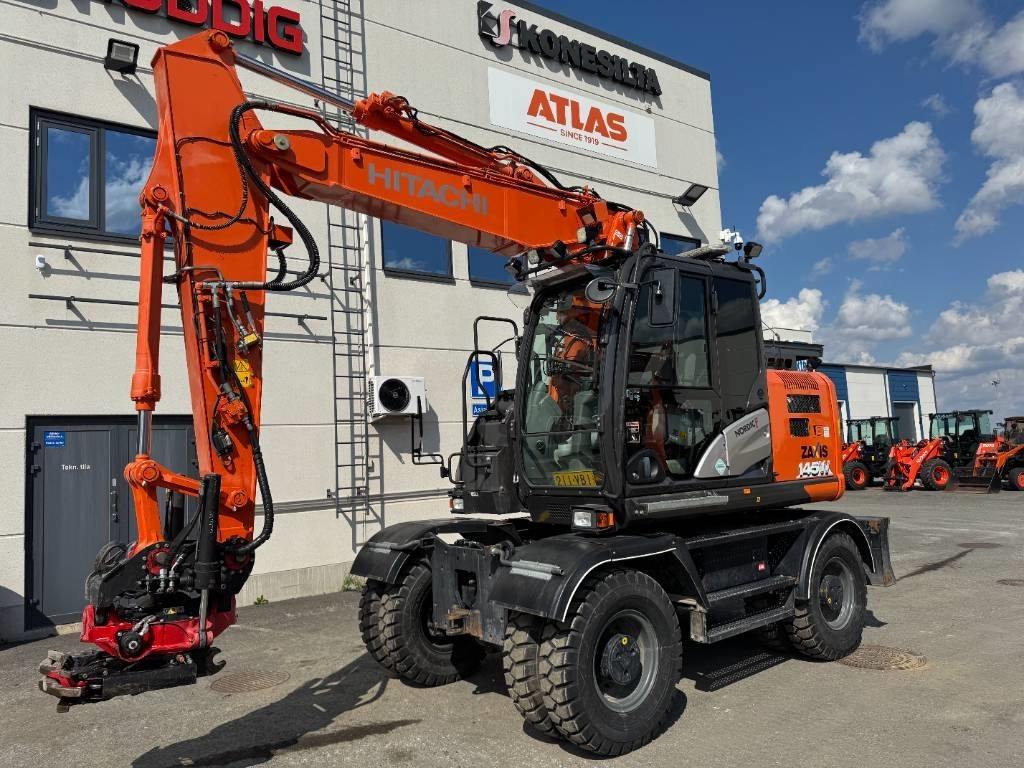 Hitachi ZX145W-6 PYÖRITTÄJÄLLÄ - Pelle sur pneus: photos 2 Hitachi ZX145W-6 PYÖRITTÄJÄLLÄ - Pelle sur pneus: photos 2