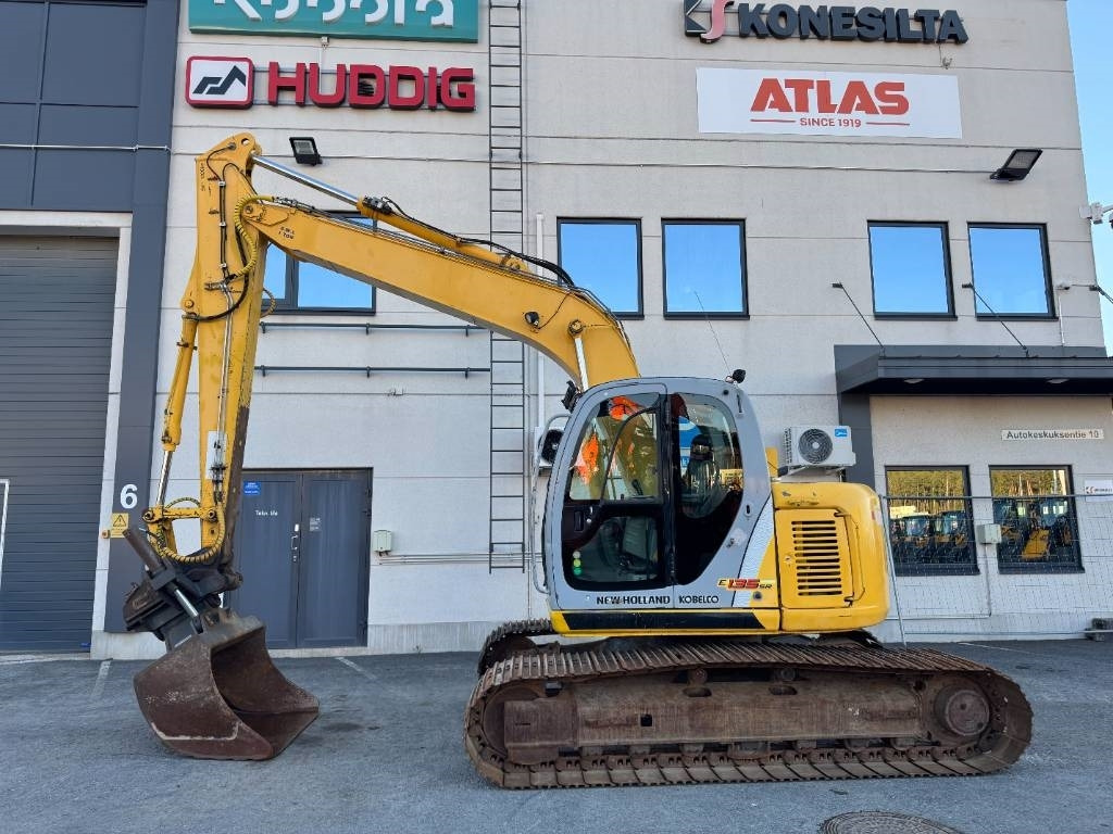 New Holland E 135 SR LC  - Pelle sur chenille: photos 1 New Holland E 135 SR LC  - Pelle sur chenille: photos 1