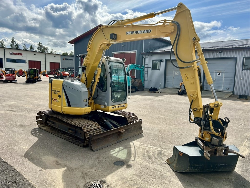 Mini pelle New Holland E 70BSR 2D MITTALAITTEET: photos 6