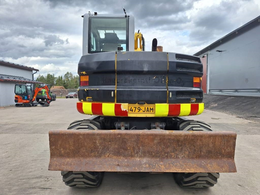New Holland MYYTY! SOLD! MH2.6 ENGCON PIHDEILLÄ - Pelle sur pneus: photos 3 New Holland MYYTY! SOLD! MH2.6 ENGCON PIHDEILLÄ - Pelle sur pneus: photos 3