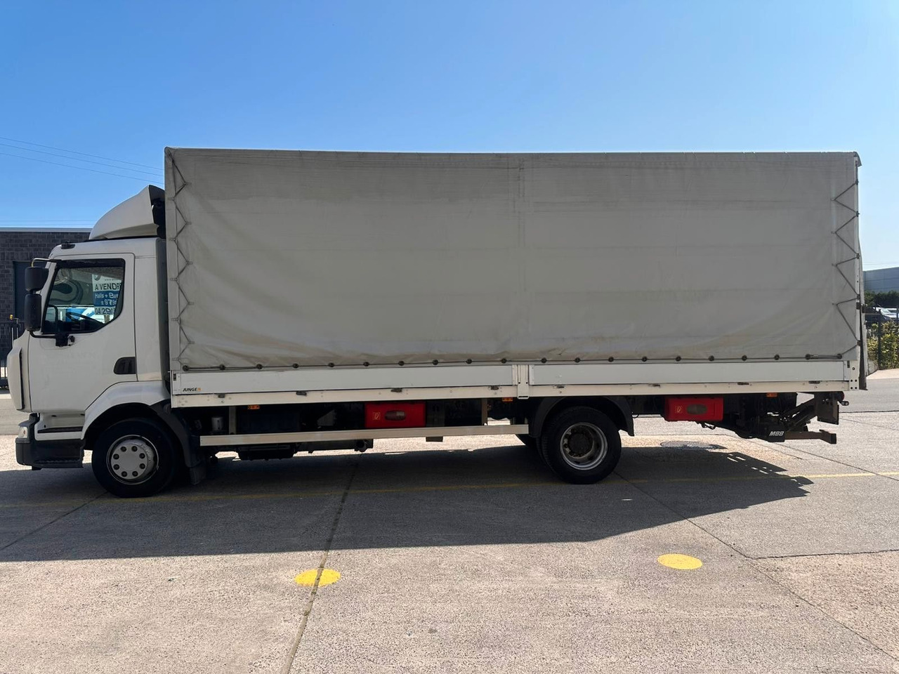 Renault Midlum dXi220-12. Klima. - Camion à rideaux coulissants: photos 1 Renault Midlum dXi220-12. Klima. - Camion à rideaux coulissants: photos 1