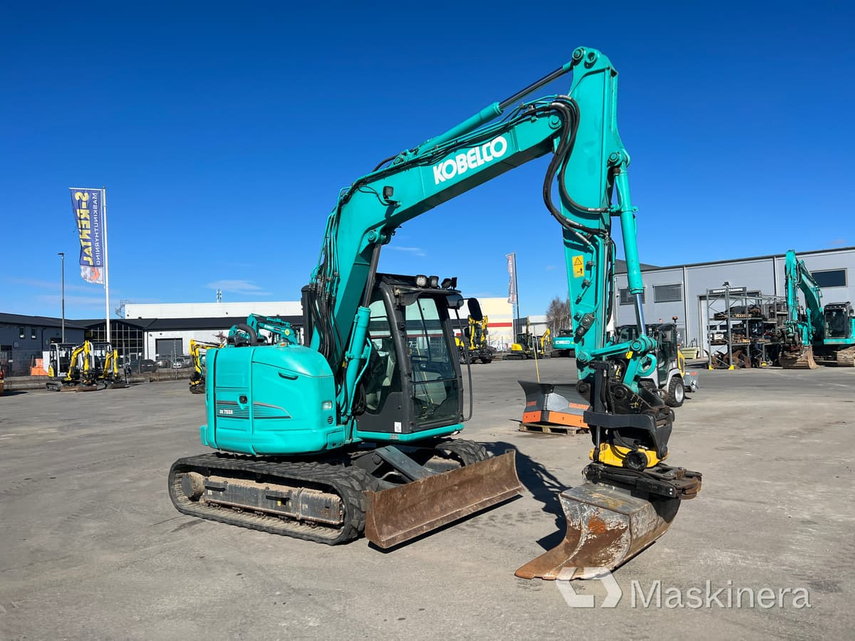 Grävmaskin Kobelco SK75SR-3E - Pelle sur chenille: photos 3 Grävmaskin Kobelco SK75SR-3E - Pelle sur chenille: photos 3