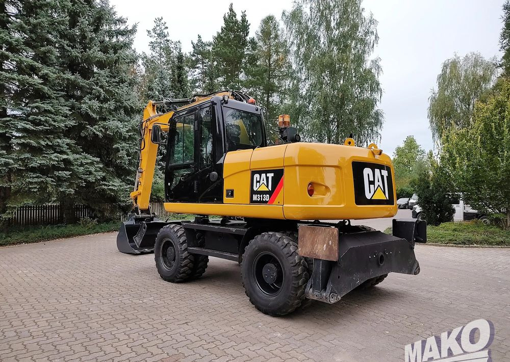 Caterpillar M313D - Pelle sur pneus: photos 2 Caterpillar M313D - Pelle sur pneus: photos 2
