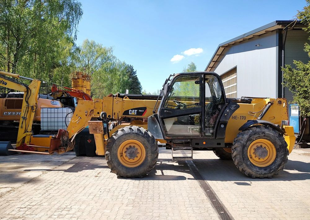 Caterpillar TH417 - Chariot télescopique: photos 1 Caterpillar TH417 - Chariot télescopique: photos 1