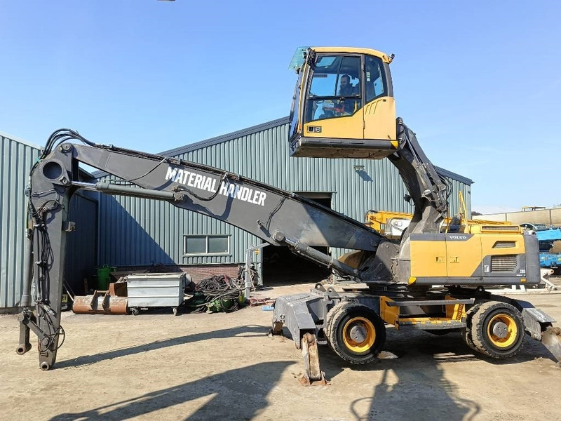 Volvo EW 210 D waste industry handler 25ton umslagbagger - Pelle de manutention: photos 1 Volvo EW 210 D waste industry handler 25ton umslagbagger - Pelle de manutention: photos 1
