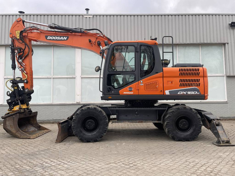 Doosan DX 160 W-5 2019 6620 H ENGCON ROTOTILT CE - Pelle sur pneus: photos 1 Doosan DX 160 W-5 2019 6620 H ENGCON ROTOTILT CE - Pelle sur pneus: photos 1