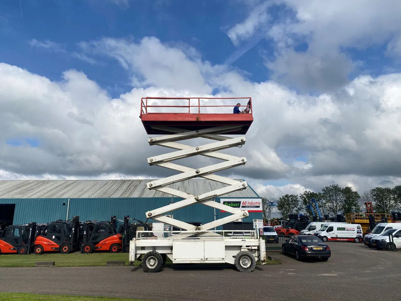 Holland lift COMBISTAR M-250DL27 4WD/P/N - Nacelle ciseaux: photos 1 Holland lift COMBISTAR M-250DL27 4WD/P/N - Nacelle ciseaux: photos 1