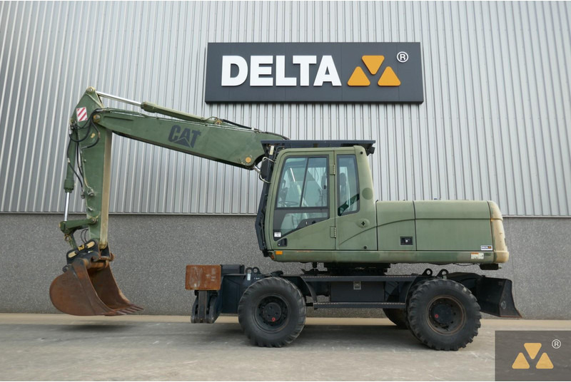 Caterpillar M318C Ex- - Pelle sur pneus: photos 1 Caterpillar M318C Ex- - Pelle sur pneus: photos 1