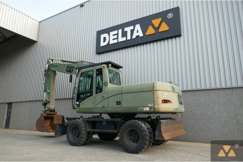 Caterpillar M318C Ex- - Pelle sur pneus: photos 4 Caterpillar M318C Ex- - Pelle sur pneus: photos 4