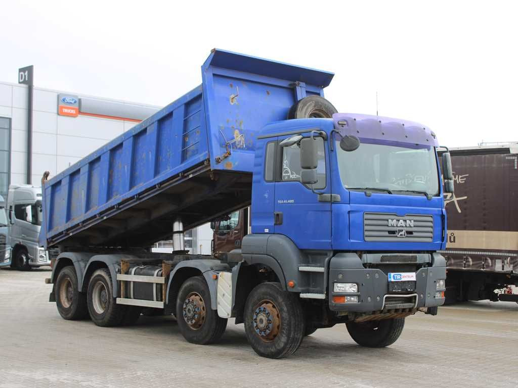 MAN TGA 41.480, 8X6, THREE-SIDED, EURO 3, RETARDER - Camion benne: photos 2 MAN TGA 41.480, 8X6, THREE-SIDED, EURO 3, RETARDER - Camion benne: photos 2