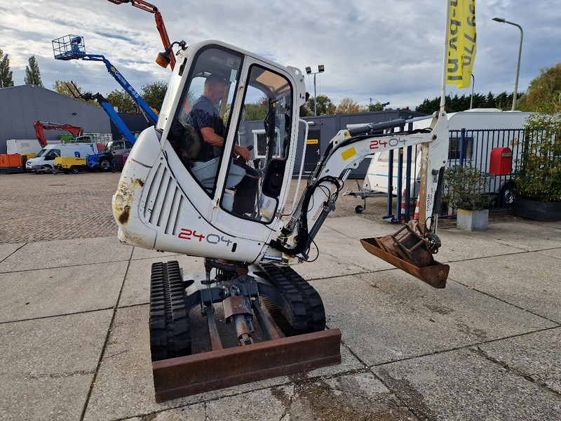 WACKER NEUSON 2404RD, kan op een berghelling draaien - Mini pelle: photos 1 WACKER NEUSON 2404RD, kan op een berghelling draaien - Mini pelle: photos 1