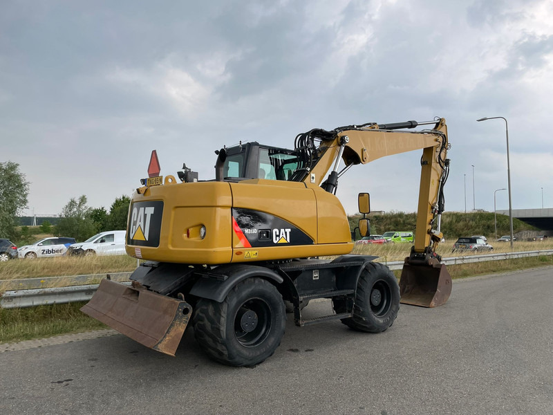 Caterpillar M313D - CE - Pelle sur pneus: photos 5 Caterpillar M313D - CE - Pelle sur pneus: photos 5