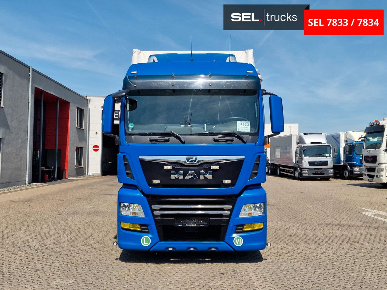 MAN TGX 18.500 4X2 LL-U / Intarder/Durchlade/Hubdach - Camion à rideaux coulissants: photos 2 MAN TGX 18.500 4X2 LL-U / Intarder/Durchlade/Hubdach - Camion à rideaux coulissants: photos 2