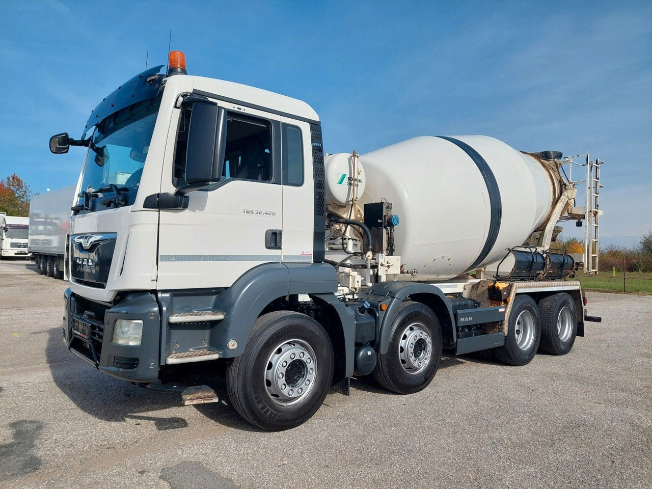 MAN TGS 32.420 BB Stetter 8x4 - Camion malaxeur: photos 1 MAN TGS 32.420 BB Stetter 8x4 - Camion malaxeur: photos 1