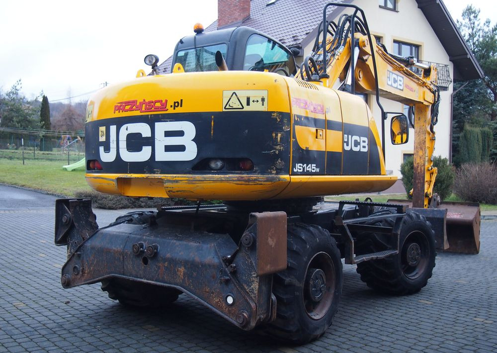 Pelle sur pneus Koparka kołowa JCB JS145W 2011 Koparka JCB: photos 10