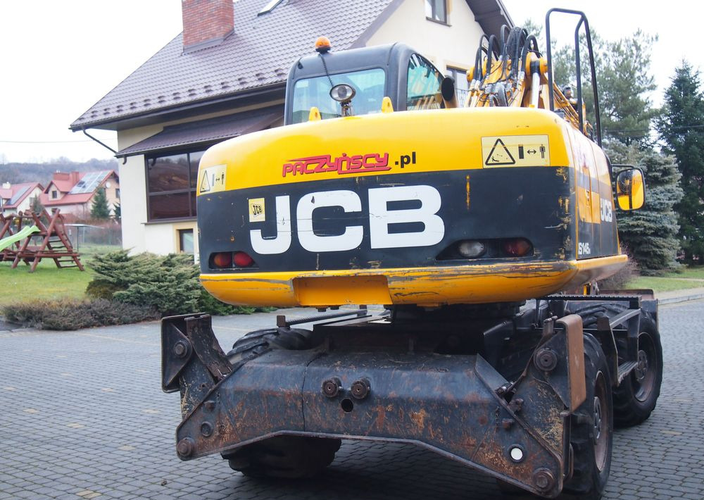 Pelle sur pneus Koparka kołowa JCB JS145W 2011 Koparka JCB: photos 14