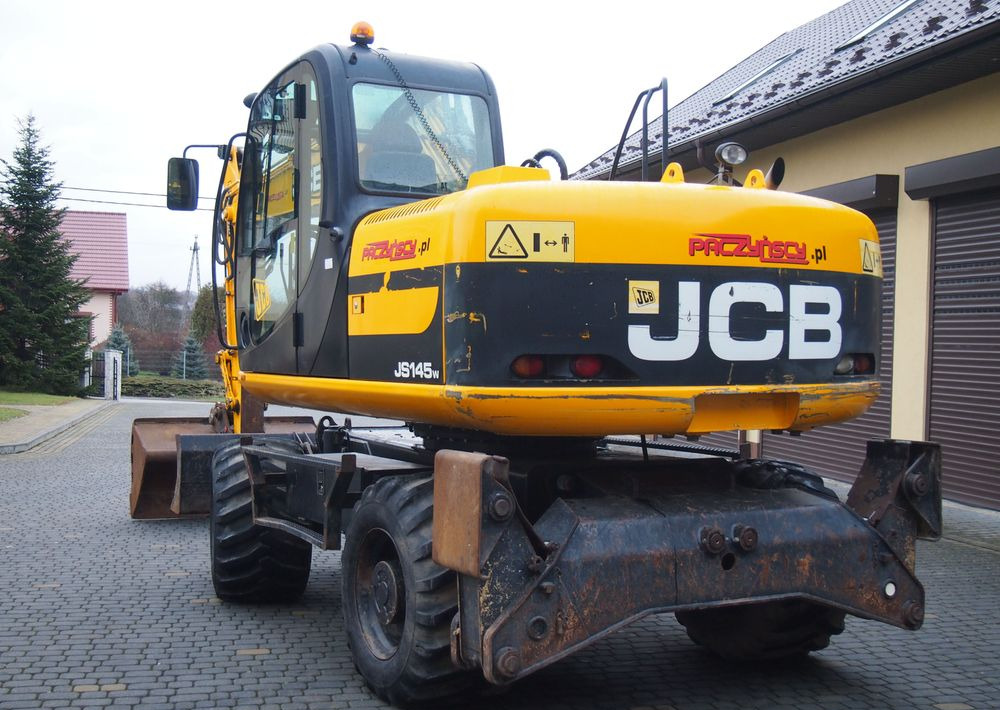 Pelle sur pneus Koparka kołowa JCB JS145W 2011 Koparka JCB: photos 9
