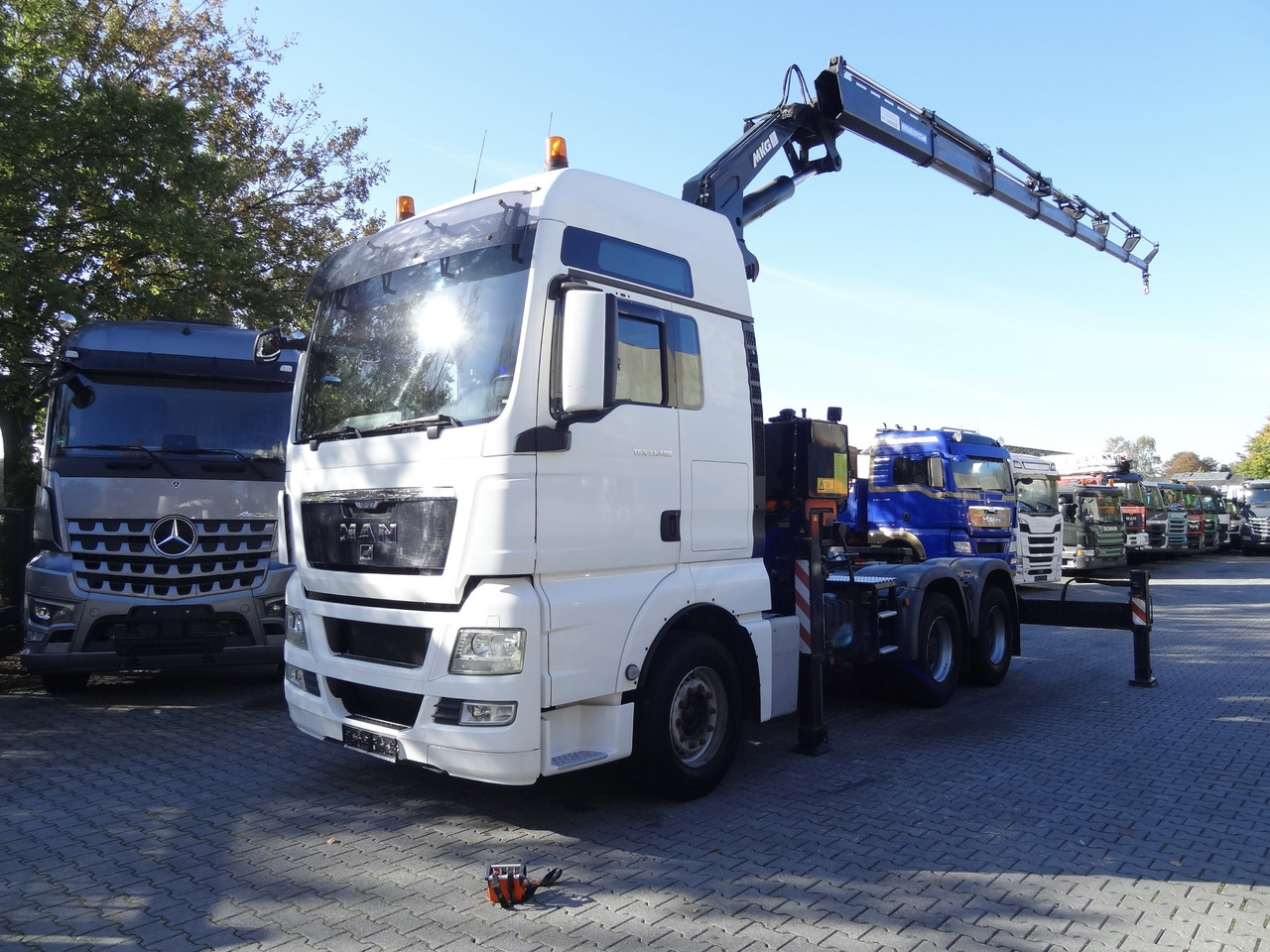 MAN TGX 33.480 6X4 Kran MKG 381 bis 20 Meter - Camion grue, Tracteur routier: photos 1 MAN TGX 33.480 6X4 Kran MKG 381 bis 20 Meter - Camion grue, Tracteur routier: photos 1