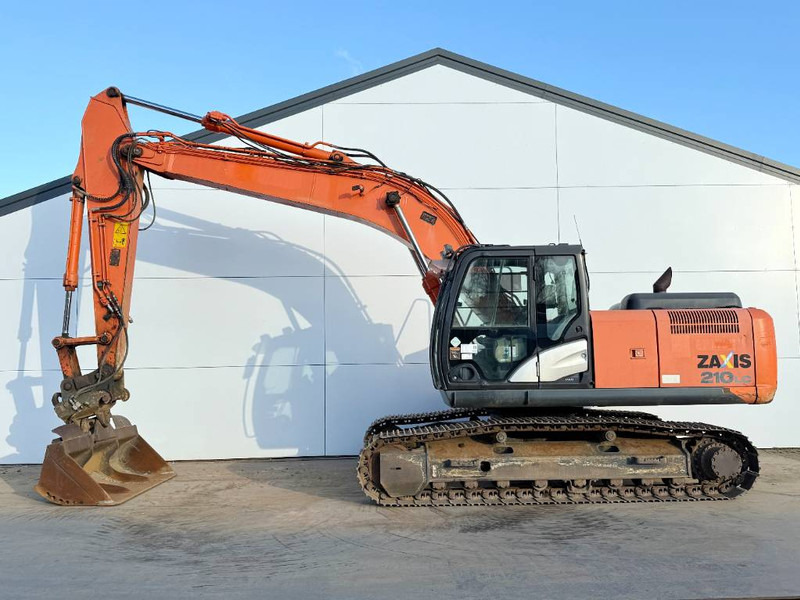 Hitachi ZX210LC-5B - Tilting Bucket / Quick Coupler - Pelle sur chenille: photos 1 Hitachi ZX210LC-5B - Tilting Bucket / Quick Coupler - Pelle sur chenille: photos 1