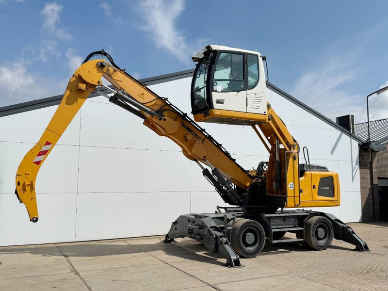 Liebherr LH22M Litronic - German Machine / Auto Greasing - Pelle de manutention: photos 1 Liebherr LH22M Litronic - German Machine / Auto Greasing - Pelle de manutention: photos 1