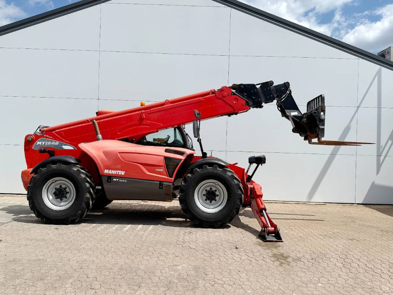 Manitou MT1840 - Dutch Machine / 4 Wheel Steering - Chariot télescopique: photos 5 Manitou MT1840 - Dutch Machine / 4 Wheel Steering - Chariot télescopique: photos 5