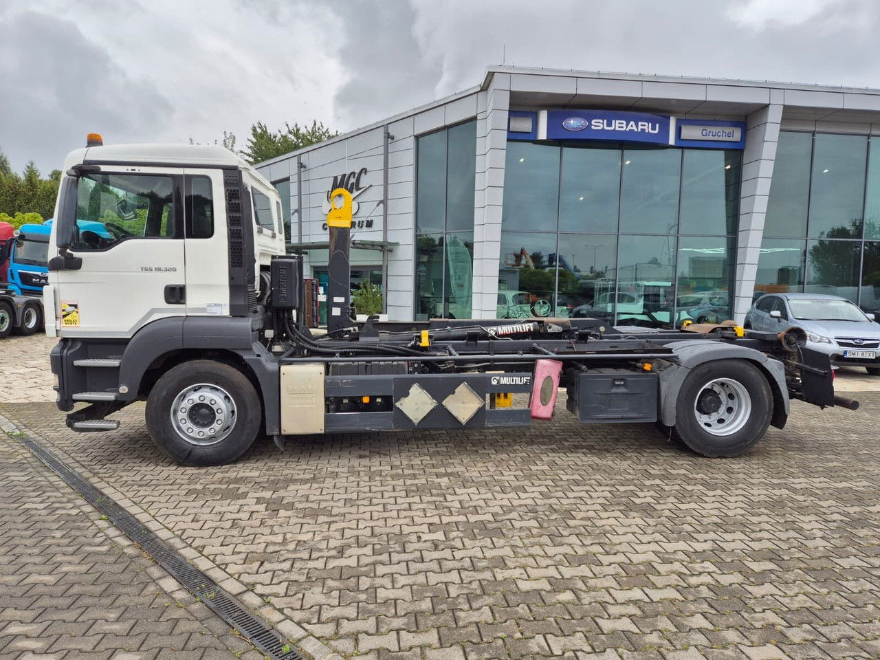 MAN TGS 18.320 Multilift UP TO 14 TON / NO Rust - Camion porte-conteneur/ Caisse mobile: photos 1 MAN TGS 18.320 Multilift UP TO 14 TON / NO Rust - Camion porte-conteneur/ Caisse mobile: photos 1