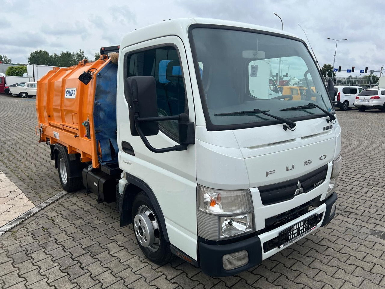 Mitsubishi Canter Fuso 3S13 AMT / Presscontainer / LOW KM / Super Condition - Benne à ordures ménagères: photos 2 Mitsubishi Canter Fuso 3S13 AMT / Presscontainer / LOW KM / Super Condition - Benne à ordures ménagères: photos 2