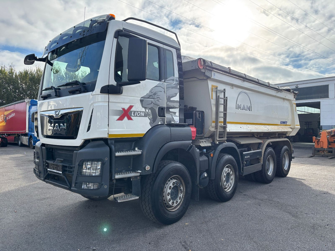 MAN TGS41.510 8x4 Schmitz Muldenkipper Retarder/19m³ - Camion benne: photos 1 MAN TGS41.510 8x4 Schmitz Muldenkipper Retarder/19m³ - Camion benne: photos 1