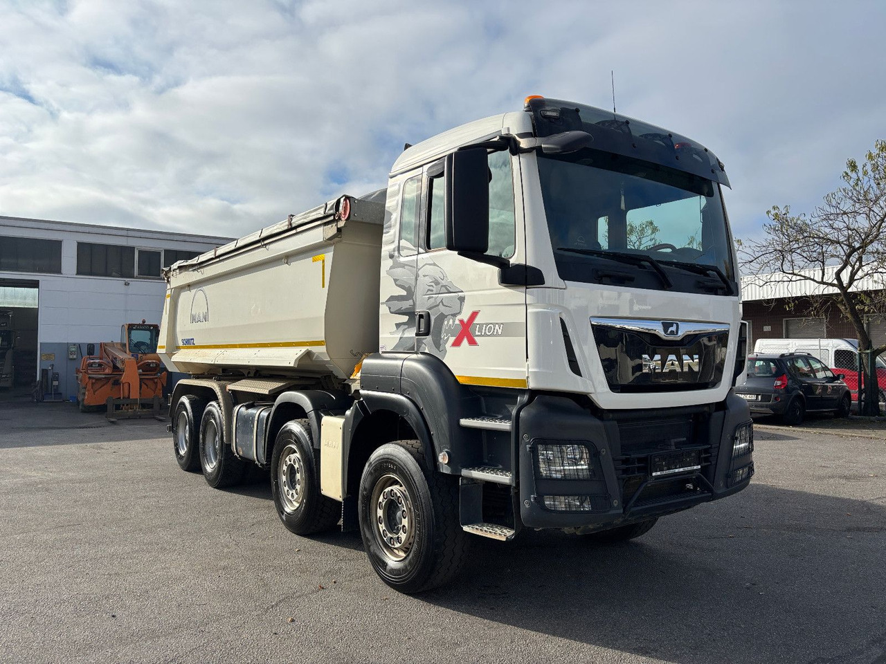 MAN TGS41.510 8x4 Schmitz Muldenkipper Retarder/19m³ - Camion benne: photos 2 MAN TGS41.510 8x4 Schmitz Muldenkipper Retarder/19m³ - Camion benne: photos 2