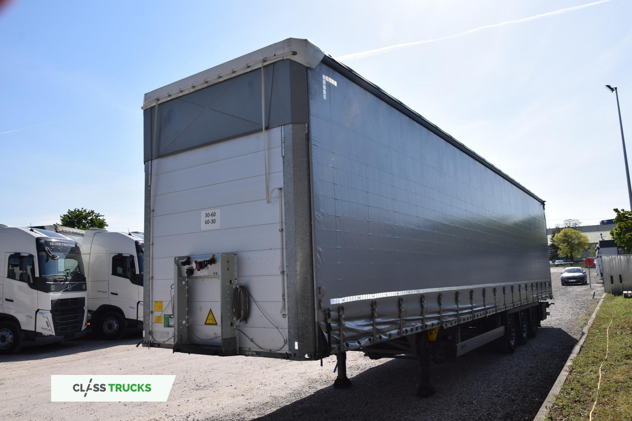 Schmitz Cargobull SCS24/L Varios - Semi-remorque rideaux coulissants: photos 1 Schmitz Cargobull SCS24/L Varios - Semi-remorque rideaux coulissants: photos 1