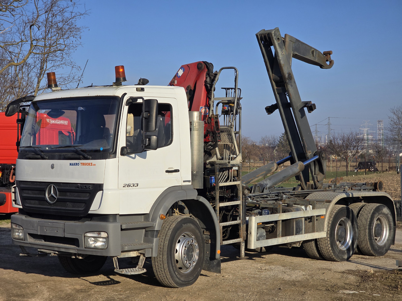 MERCEDES-BENZ AXOR 2633 6X4 / HOOK SYSTEM / HMF 1066 - Camion ampliroll, Camion grue: photos 2 MERCEDES-BENZ AXOR 2633 6X4 / HOOK SYSTEM / HMF 1066 - Camion ampliroll, Camion grue: photos 2