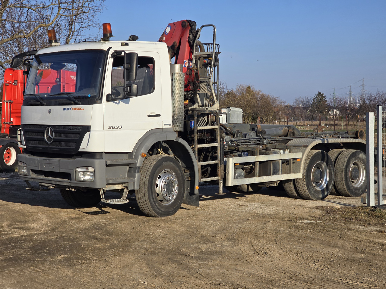 MERCEDES-BENZ AXOR 2633 6X4 / HOOK SYSTEM / HMF 1066 - Camion ampliroll, Camion grue: photos 1 MERCEDES-BENZ AXOR 2633 6X4 / HOOK SYSTEM / HMF 1066 - Camion ampliroll, Camion grue: photos 1