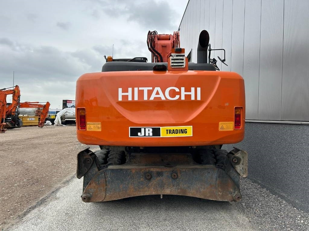 Hitachi ZX220W-5B - Pelle sur pneus: photos 3 Hitachi ZX220W-5B - Pelle sur pneus: photos 3