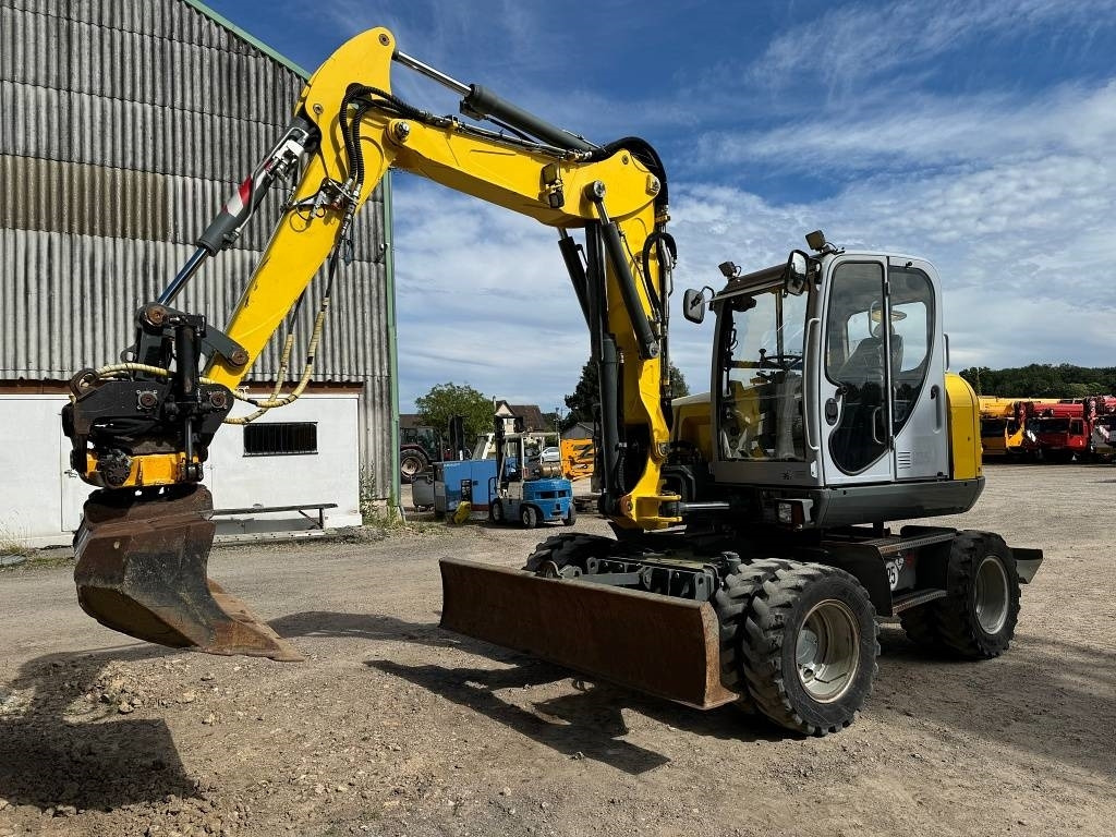 Wacker Neuson EW 100 - Pelle sur pneus: photos 1 Wacker Neuson EW 100 - Pelle sur pneus: photos 1
