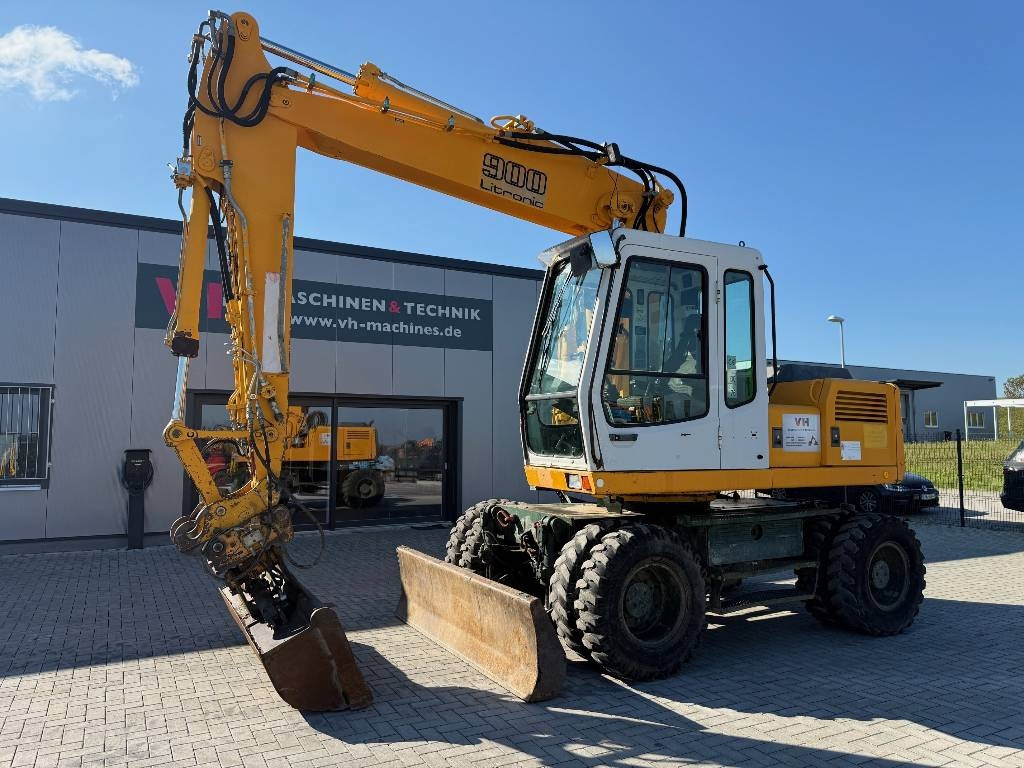 Liebherr A 900 Litronic - Pelle sur pneus: photos 1 Liebherr A 900 Litronic - Pelle sur pneus: photos 1