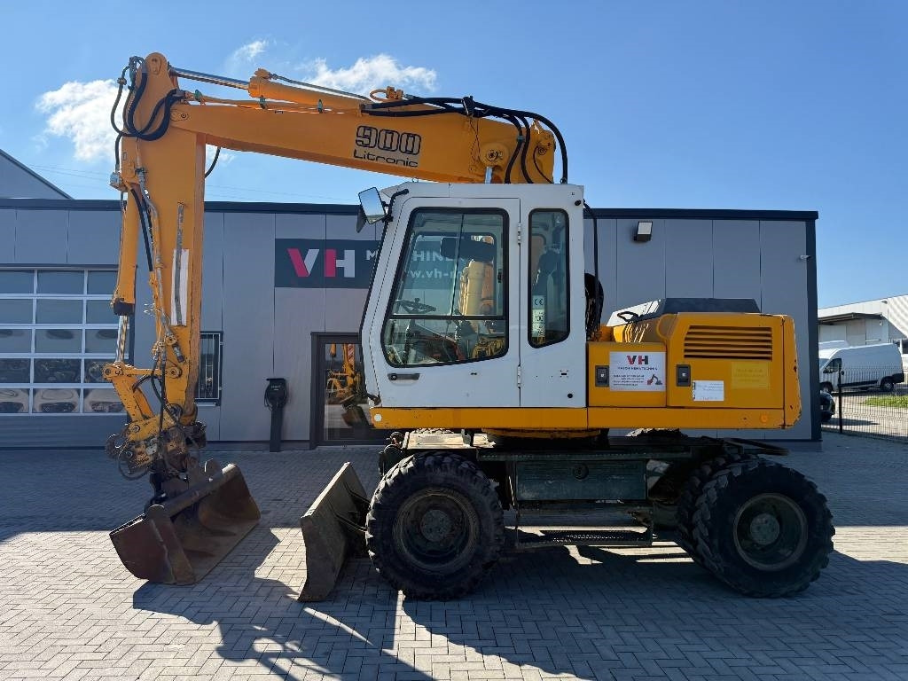 Liebherr A 900 Litronic - Pelle sur pneus: photos 2 Liebherr A 900 Litronic - Pelle sur pneus: photos 2