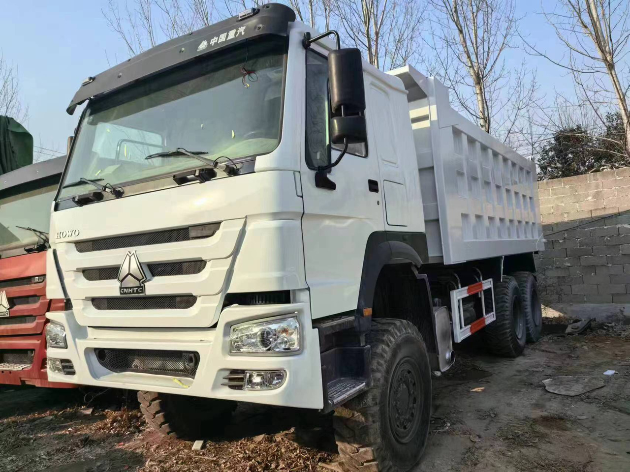 HOWO 6*6 - Camion benne: photos 1 HOWO 6*6 - Camion benne: photos 1