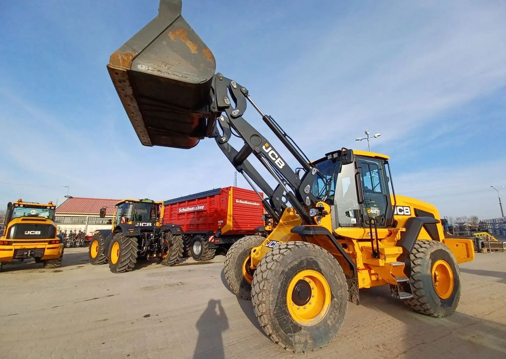 Pelle sur pneus JCB 427 HT: photos 12