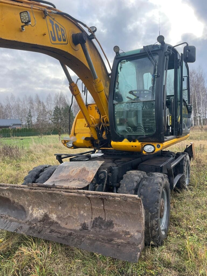 JCB JS 145 W - Pelle sur pneus: photos 1 JCB JS 145 W - Pelle sur pneus: photos 1