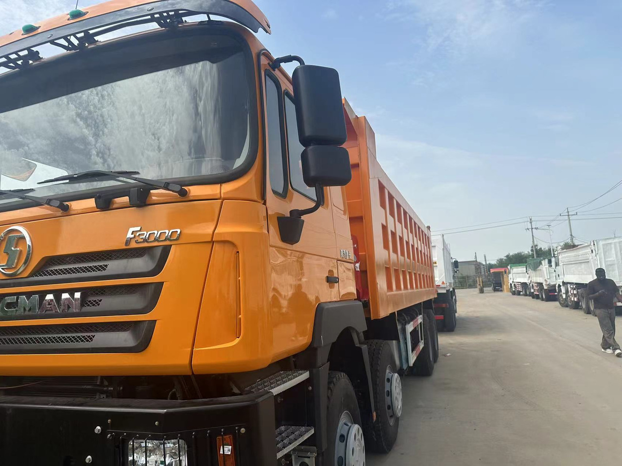 Shacman F3000 8x4 - Camion benne: photos 1 Shacman F3000 8x4 - Camion benne: photos 1